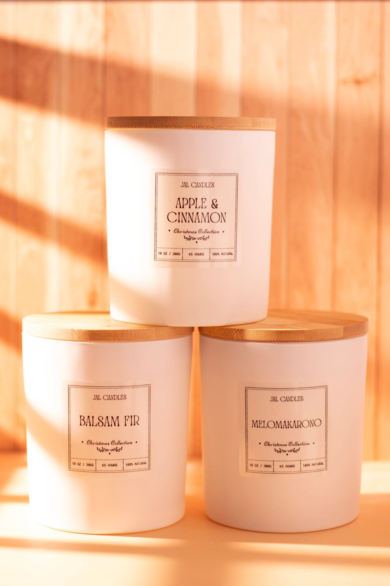 Christmas Candle Set Grand Trio 300g with three handmade soy wax candles - Balsam Fir, Apple & Cinnamon, and Melomakarono scents with wooden lids