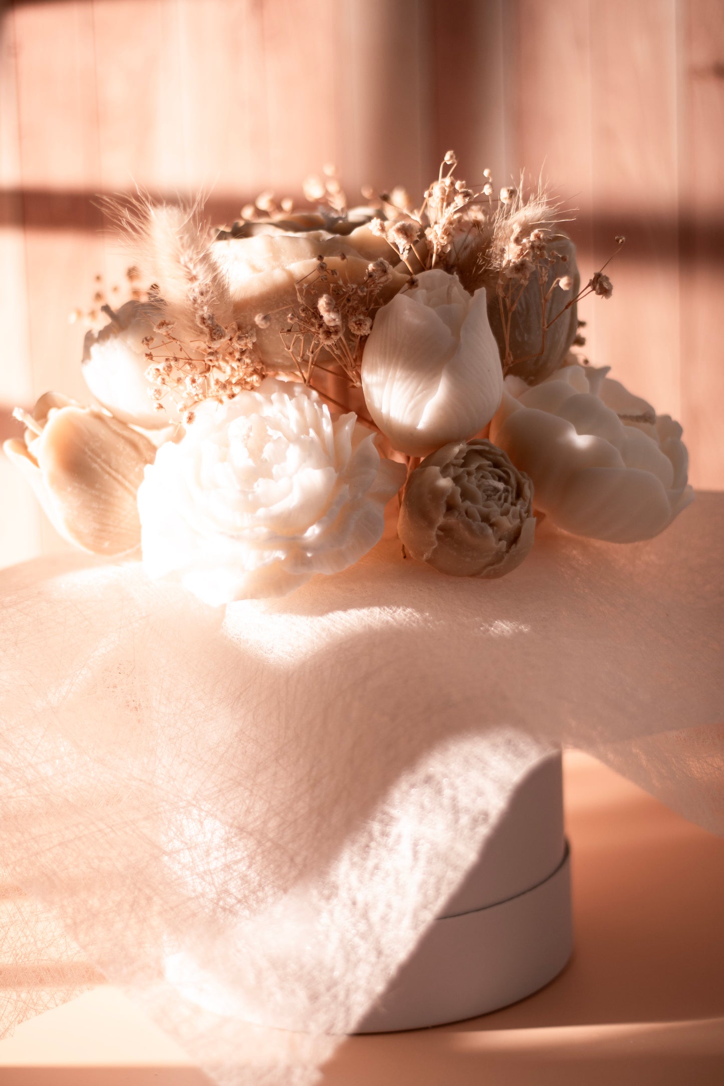 Handmade wax flower bouquet by JAL Candles, featuring sculpted blooms in soft sunlight, crafted in Cyprus.