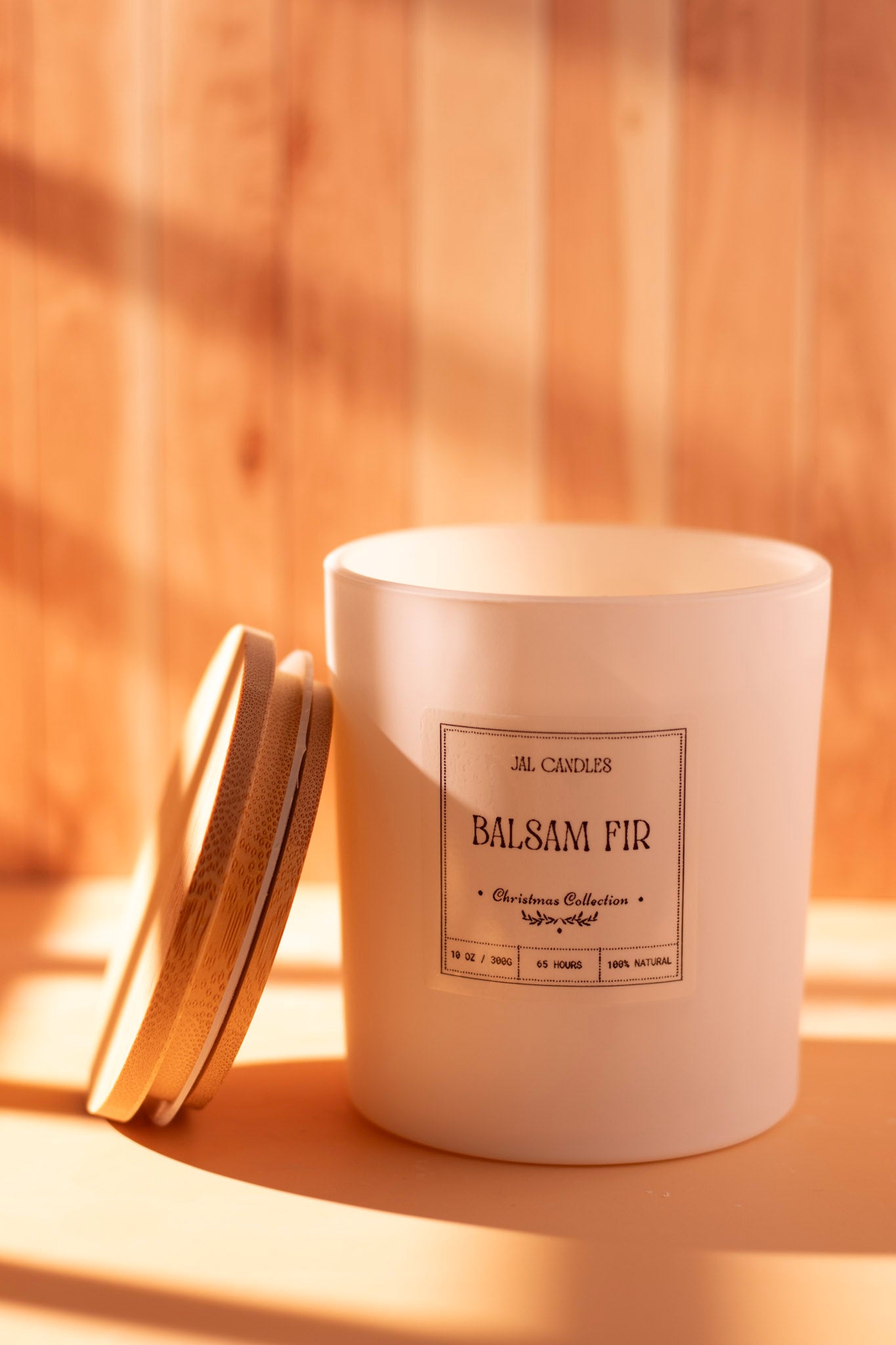 Balsam Fir handmade soy candle in white ceramic jar with wooden lid
