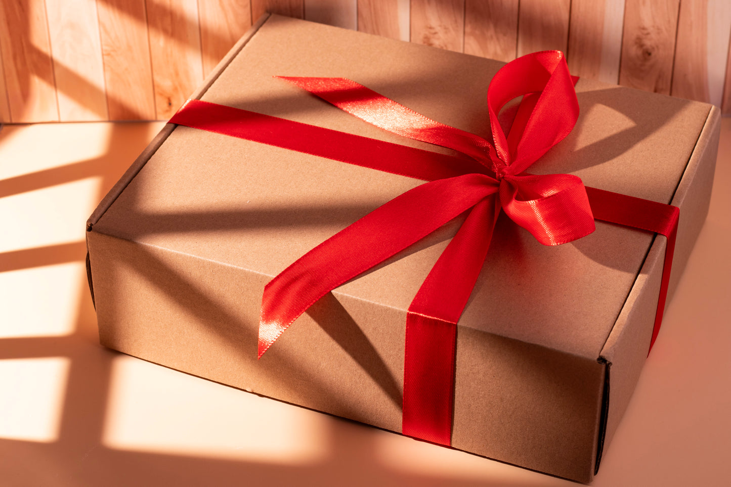 Festive candle gift boxes from JAL Candles Cyprus, showcasing the Christmas Collection in cozy natural light with holiday details.