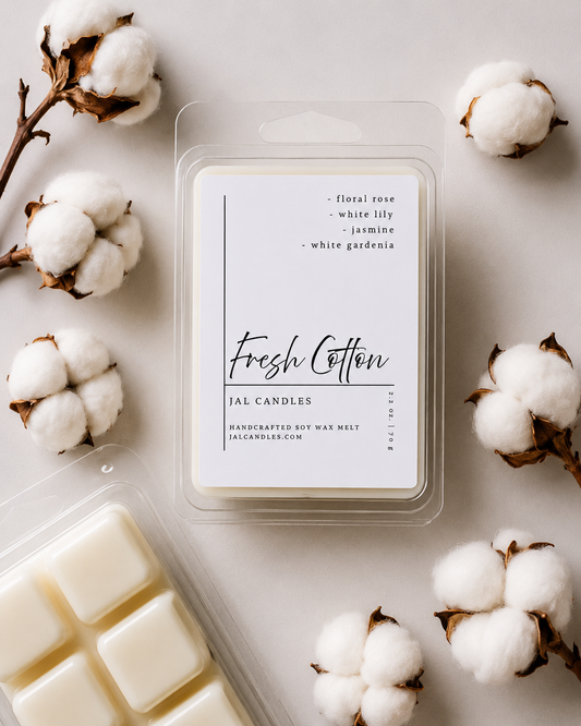 Fresh Cotton wax melt clamshell surrounded by natural cotton bolls on stems