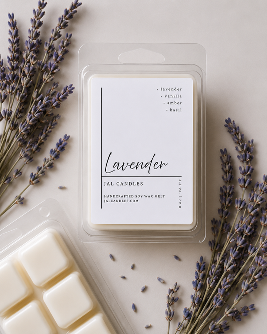 Lavender wax melt clamshell pack beside dried lavender sprigs and open melt tray