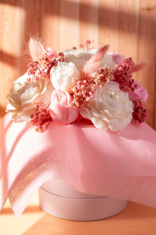 Handcrafted wax flower bouquet with pink and white blooms by JAL Candles, displayed in warm sunlight, made in Cyprus.
