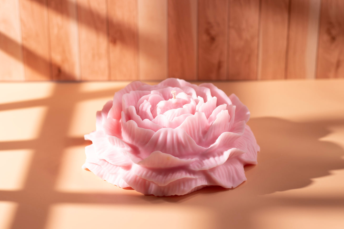 Luxury rose-pink peony sculpted candle by JAL Candles, handcrafted from soy wax and photographed in warm natural light, crafted in Cyprus.