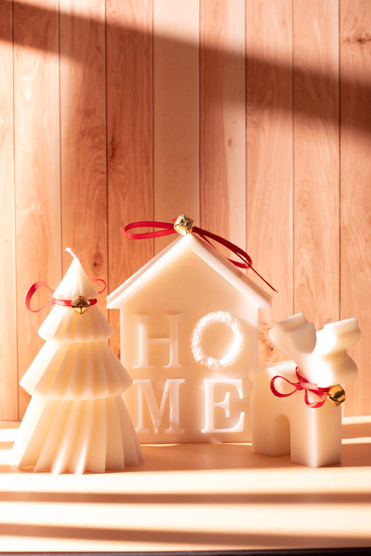 Handmade Secret Santa candle gift box by JAL Candles Cyprus – includes house, tree, and reindeer candles.