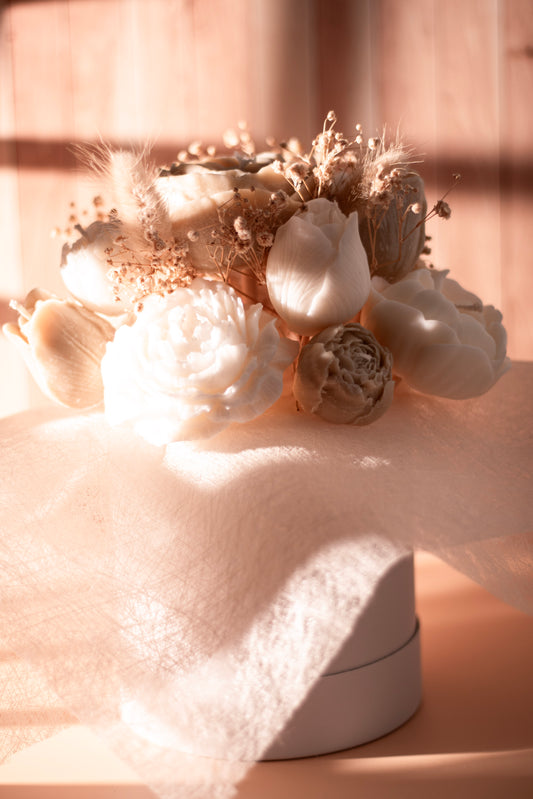 Handmade wax flower bouquet by JAL Candles, featuring sculpted blooms in soft sunlight, crafted in Cyprus.