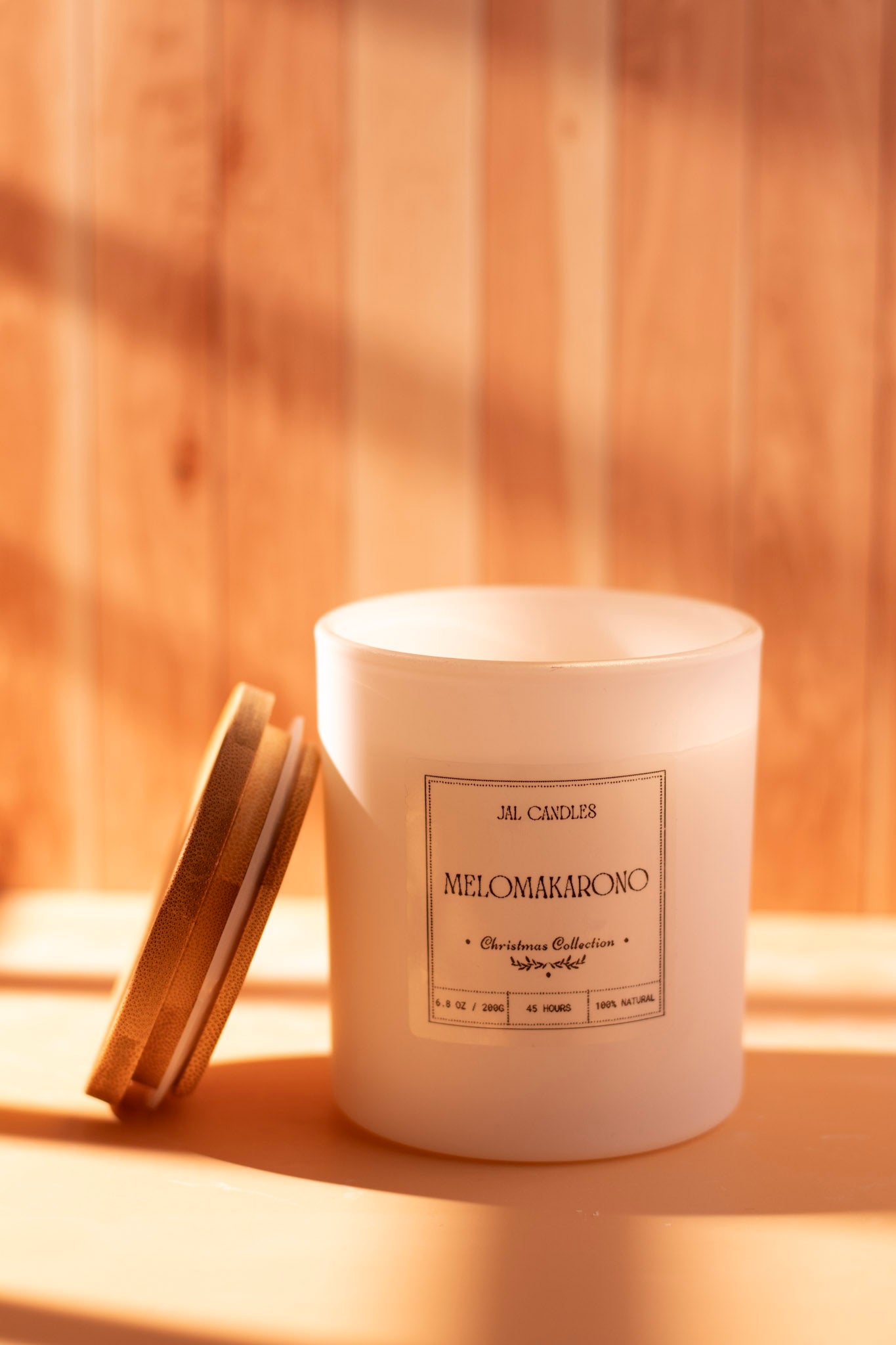 Melomakarono candle with cinnamon stick decoration