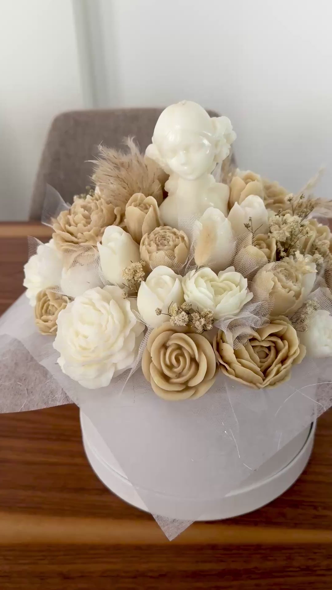 The Grand Bouquet candle bouquet featuring 42 handcrafted wax flowers in ivory and beige tones with an artistic feminine centerpiece, handmade in Cyprus