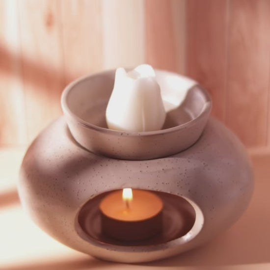 Tulip wax melt melting in a candle burner, demonstrating how to use a candle bouquet as wax melts